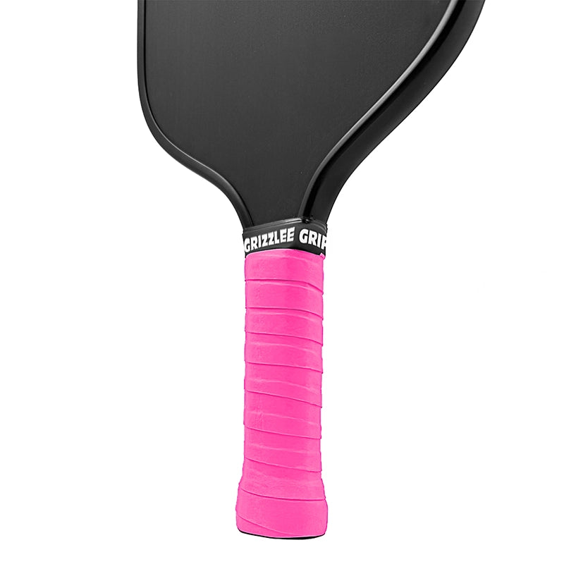 Premium tacky neon pink pickleball grip for competitive performance and sweat resistance.